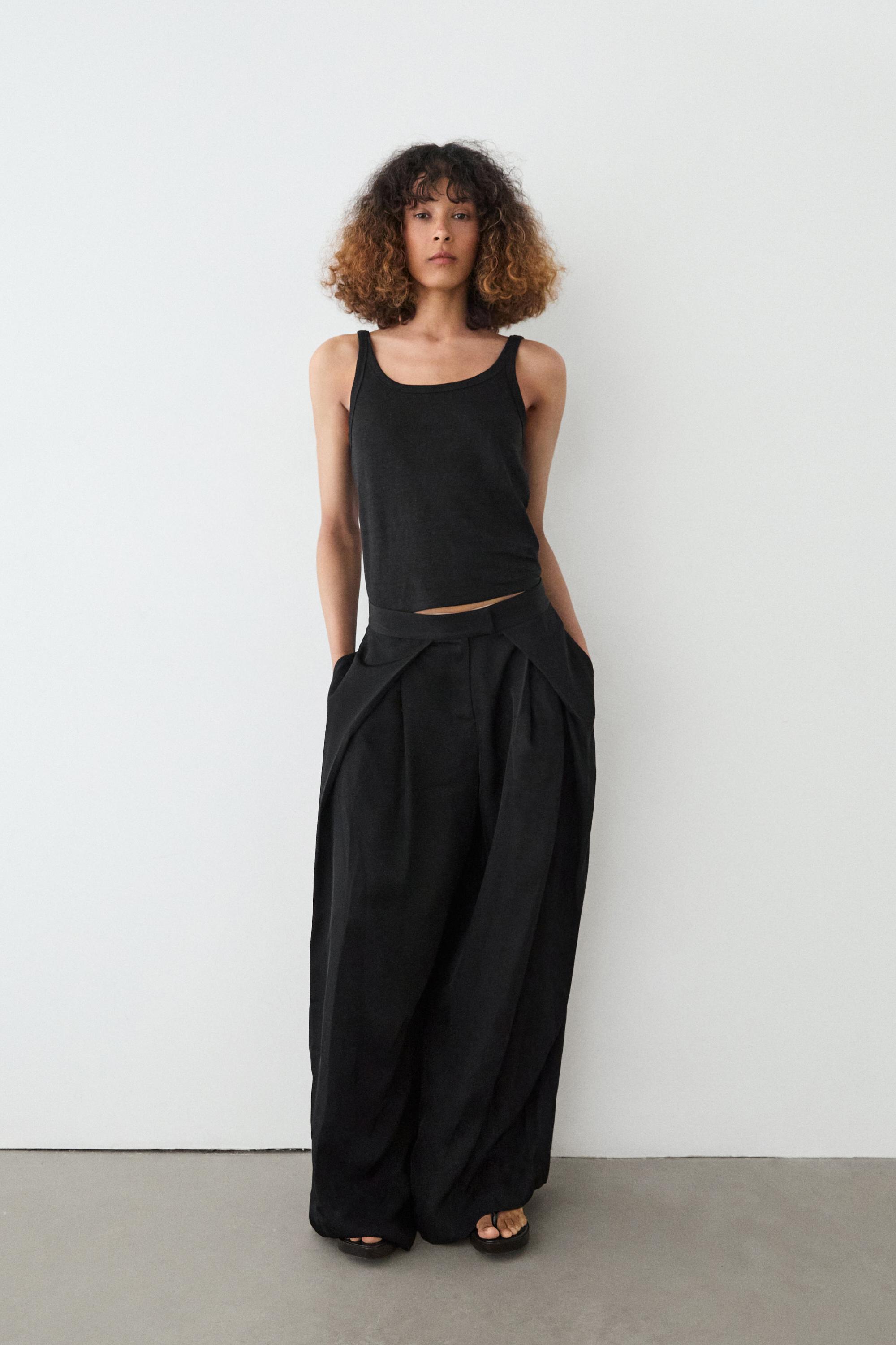 Pantalon satiné à pinces